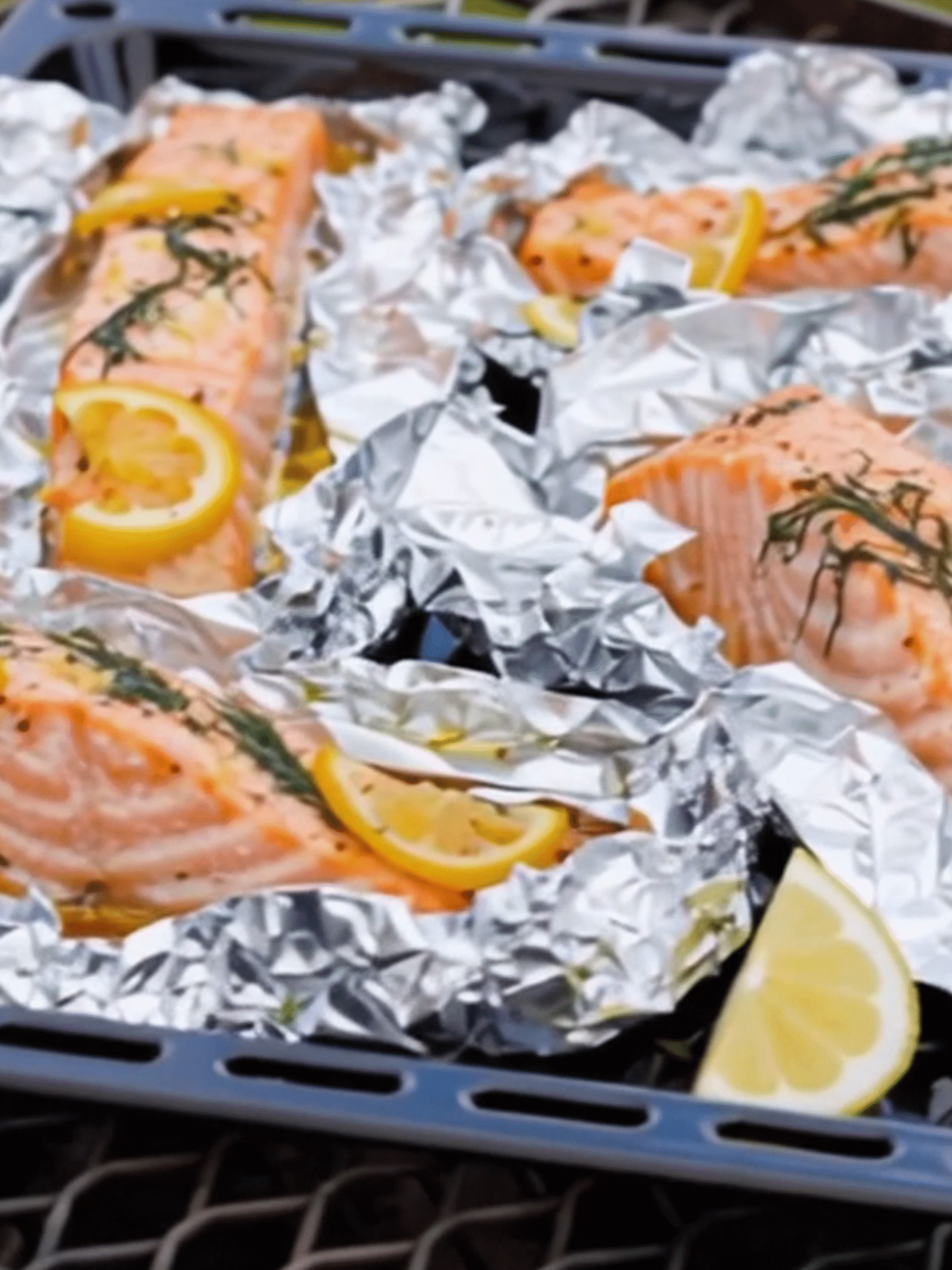 Foil Packet Grilled Salmon with Lemon and Dill Grilled salmon fillets in foil packets with lemon and herbs