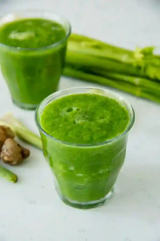 Best Detox Smoothie for Weight Loss with Celery and Ginger Best Detox Smoothie for Weight Loss in two clear glasses with fresh celery and ginger on a white surface