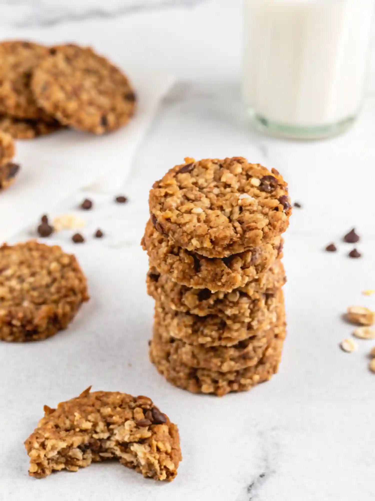 Healthy Breakfast Cookie Stack Stack of Healthy Breakfast Cookies made with oats and chocolate chips served on a marble surface.