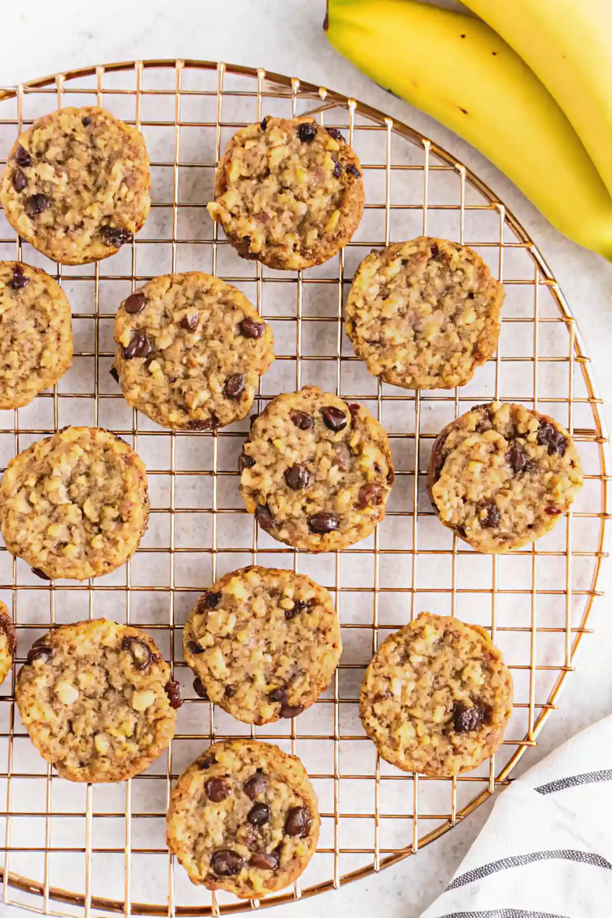 Healthy Breakfast Cookie Cooling Rack Healthy Breakfast Cookies cooling on a wire rack with visible oats and chocolate chips.