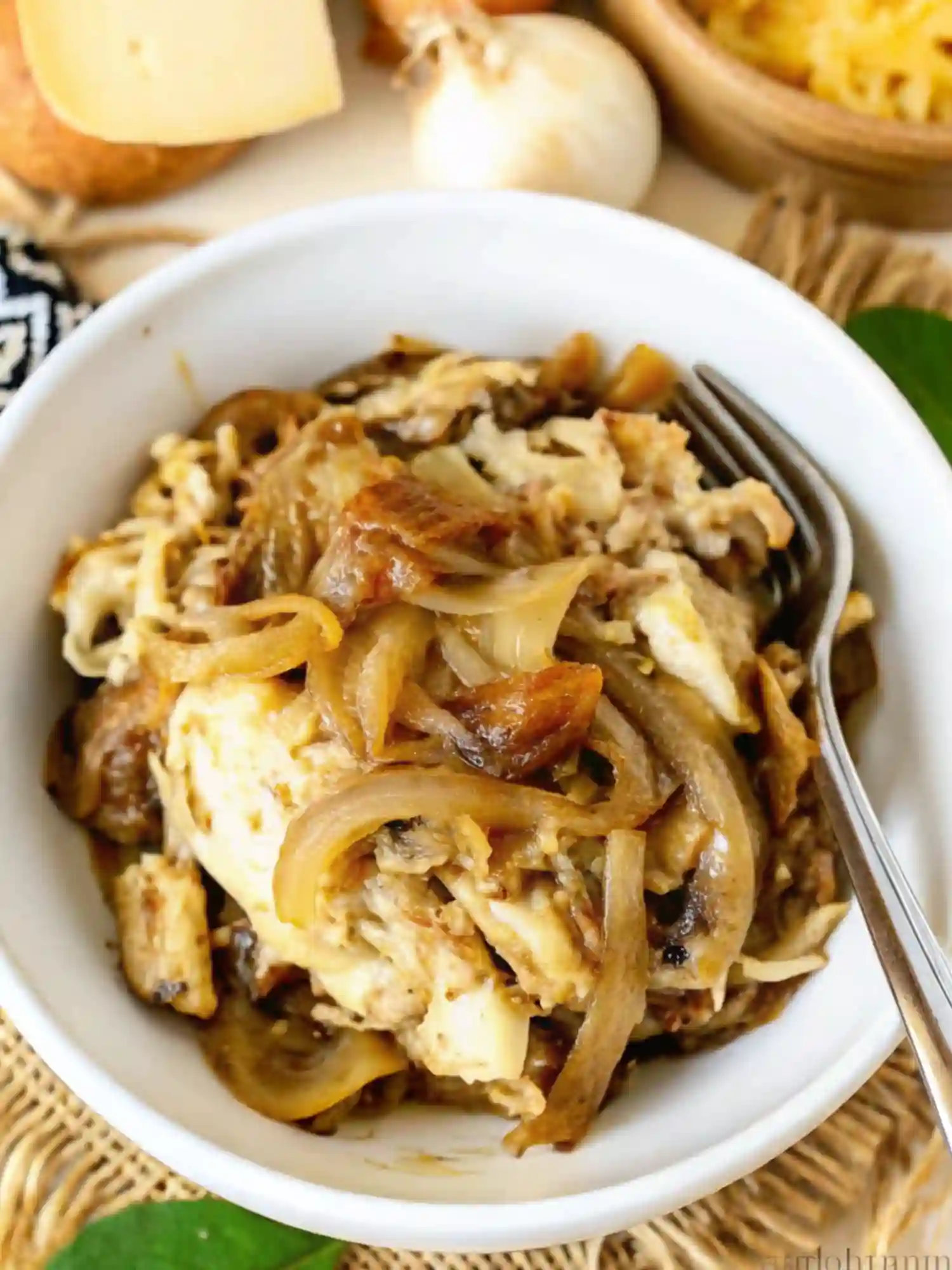 French Onion Chicken Orzo Bowl French Onion Chicken Orzo served in a bowl with caramelized onions, tender chicken, and melted cheese