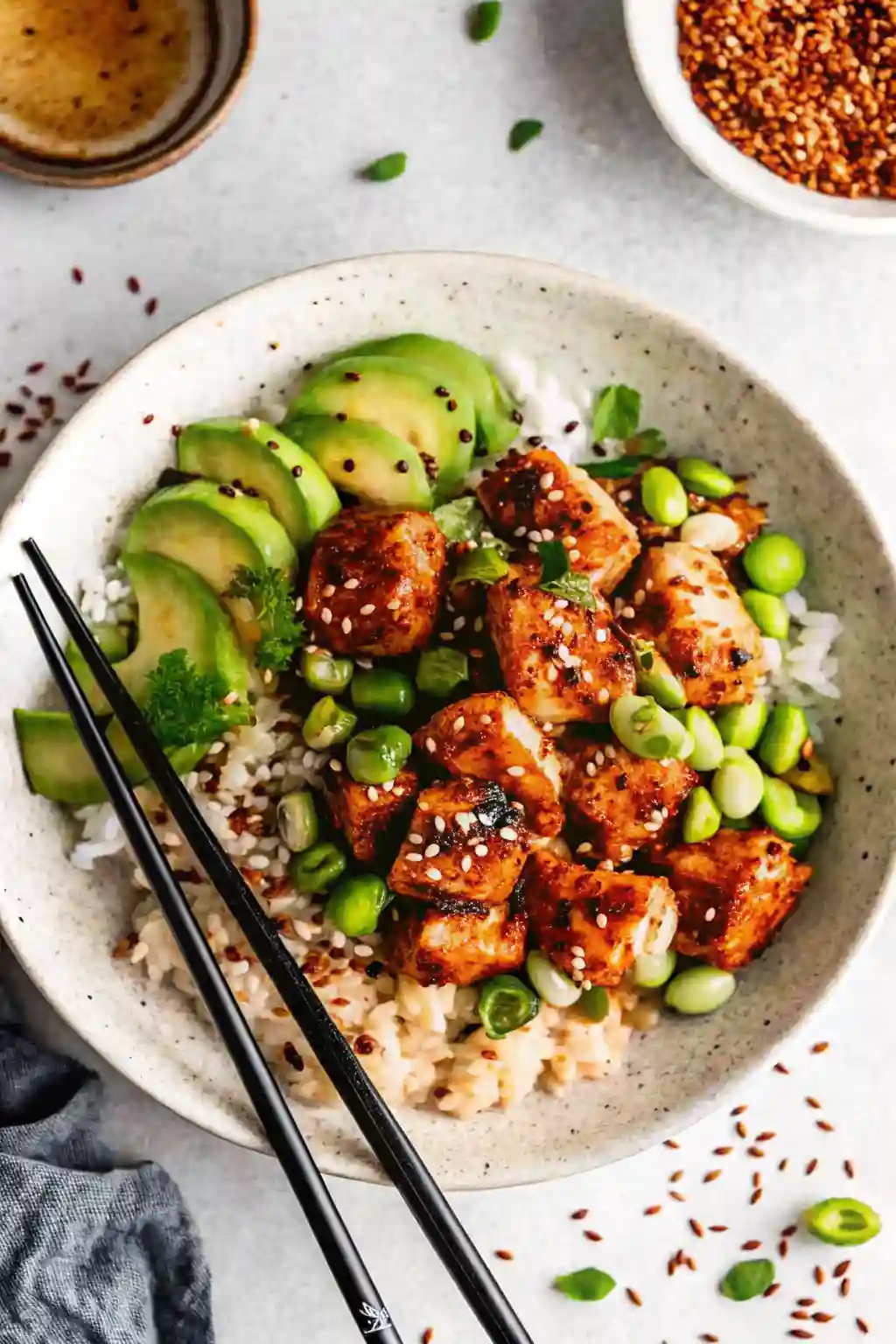 Healthy Honey Sriracha Salmon Bowl with Rice and Avocado healthy honey sriracha salmon bowl with rice avocado edamame and sesame seeds